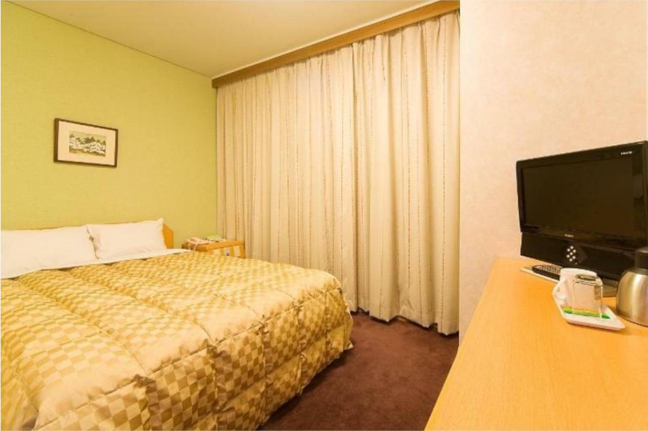 Highness Hotel Kurume Buitenkant foto